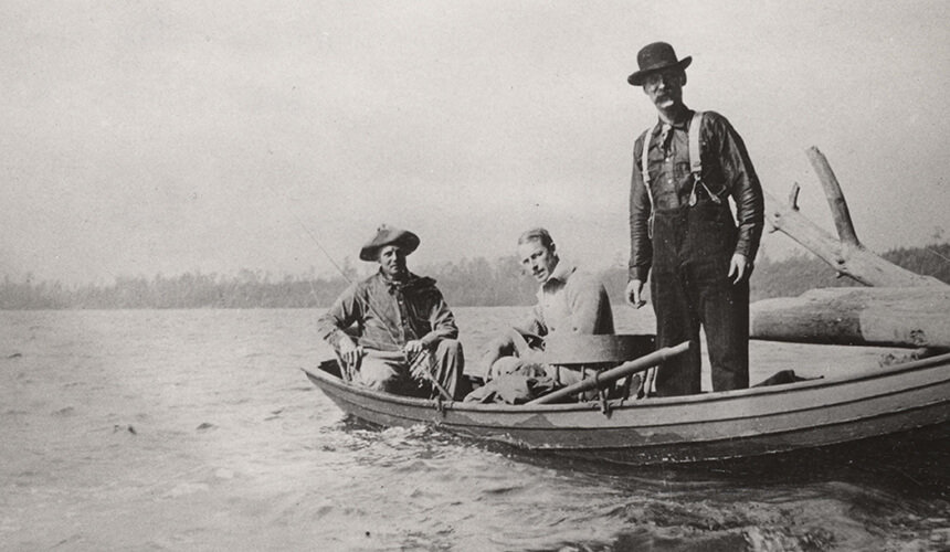 Turner, with hat, goes boating with companions thought to be a neighbor and Charles Van Hise.