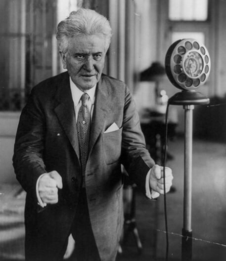 La Follette delivering one of his radio addresses.