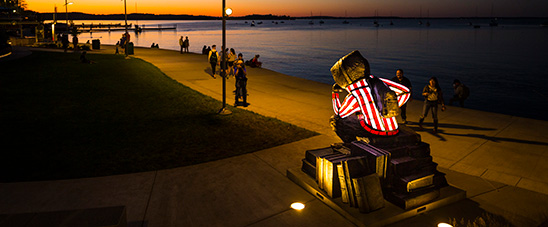 Well Red Bucky overlooking a Lake Mendota sunset