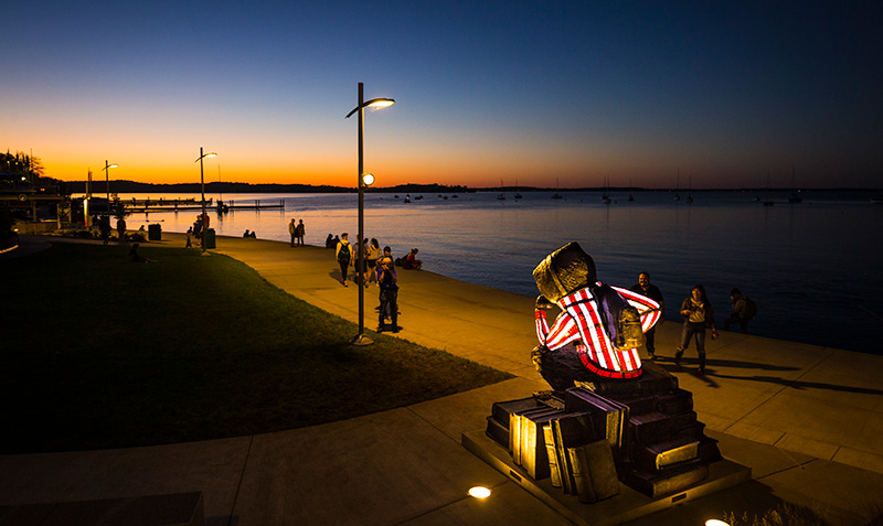 Well Red Bucky overlooking a Lake Mendota sunset