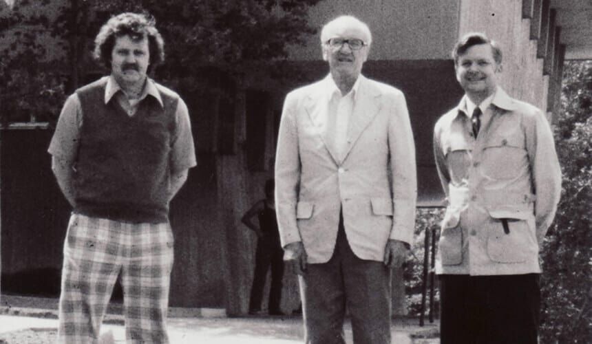 Jim Kitchell, in plaid, and John Magnuson to Arthur Hasler's left.