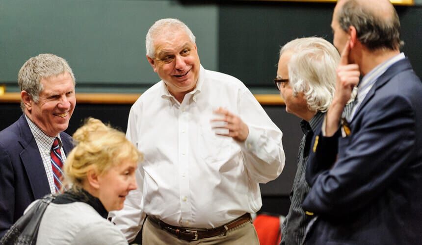 Errol Morris talking with guests.