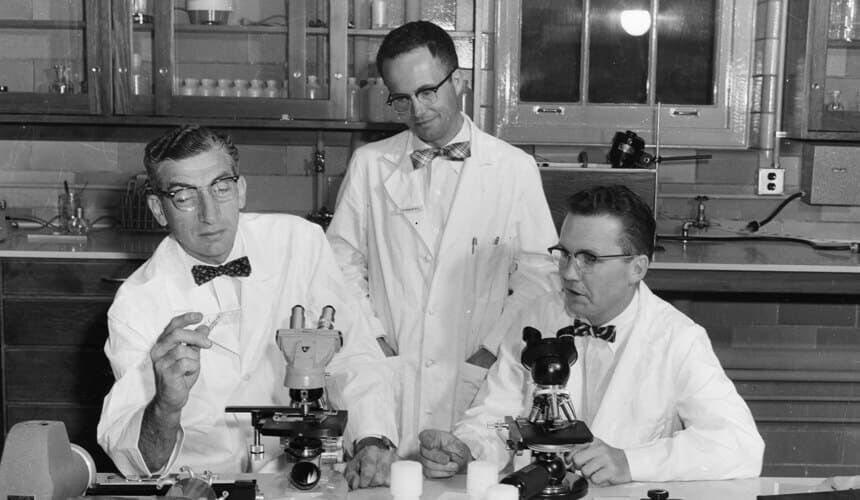 Harry Waisman, C.W. Reiquam, and Nathan Smith work together in a research lab. (Image courtesy of the UW Archives, #S04103.) Harry Waisman, C.W. Reiquam, and Nathan Smith work together in a research lab.