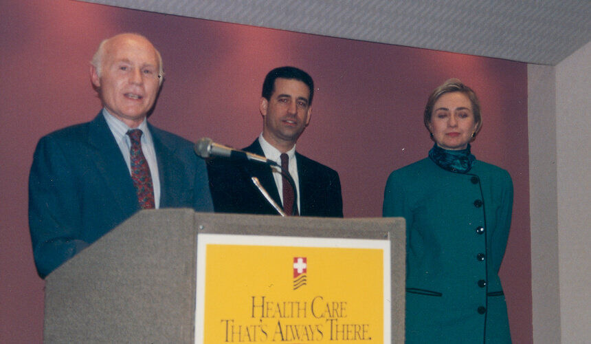 Senator Herbert H. Kohl, Russ Feingold, and Hillary Clinton in 1994. Sign on podium says "Health Care That's Always There, The National Health Care Campaign". (Image courtesy of the Wisconsin Historical Society.) Senator Herbert H. Kohl, Russ Feingold, and Hillary Clinton