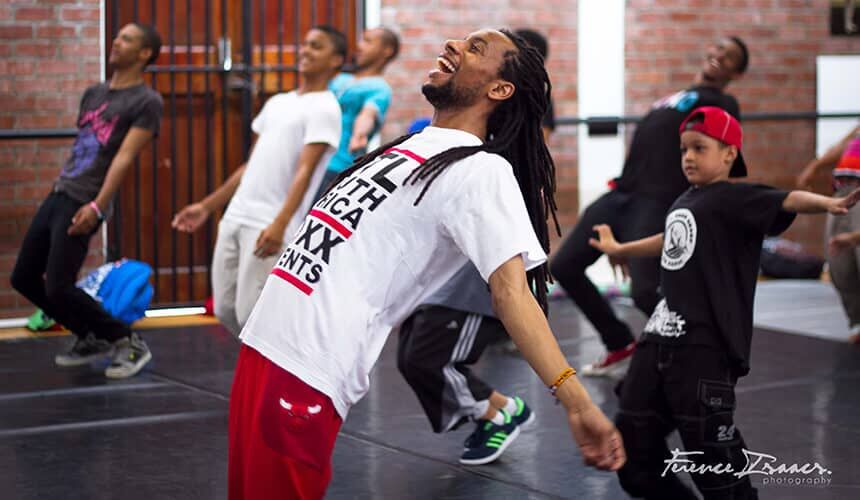 King also manages his own production company, King’s Eye View Productions. (Photo courtesy of Ference Isaacs.) King dancing with others.