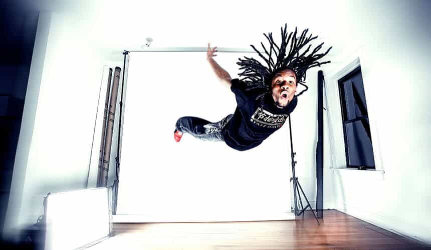 King is a 2014 recipient of the Wisconsin Alumni Association’s Forward under 40 Award. (Photo courtesy of David Chen.) King jumping into the air.