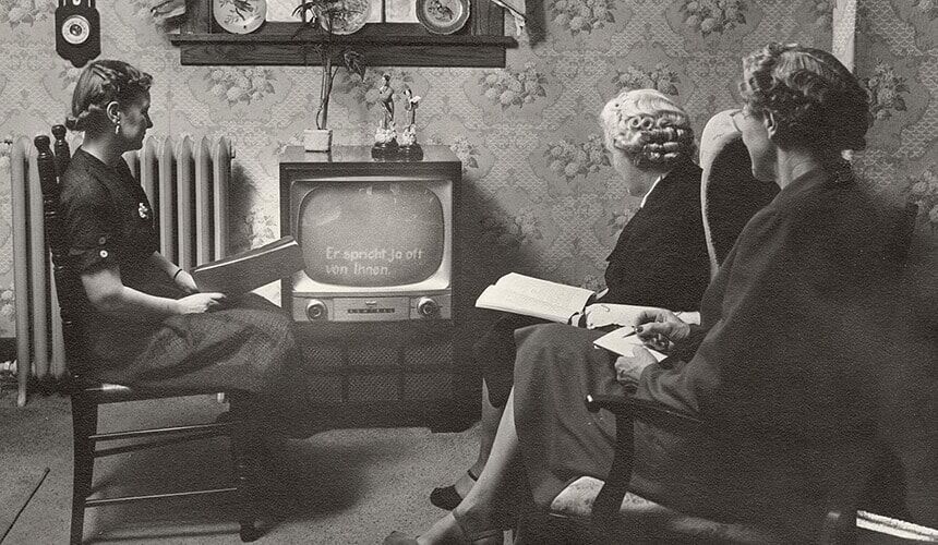 Wisconsin family viewing German language course via at-home television instruction.