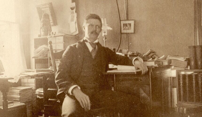 Turner poses in his office. (Image courtesy of the Wisconsin Historical Society, #28393.) Turner poses in his office.
