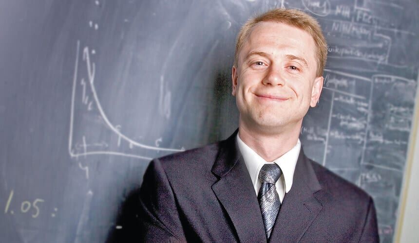 Rustem Ismagilov was recognized as the most outstanding chemist under the age of forty by the American Chemical Society in 2008. (Photo by Jason Smith / University of Chicago.) Rustem Ismagilov standing in front of a chalkboard.