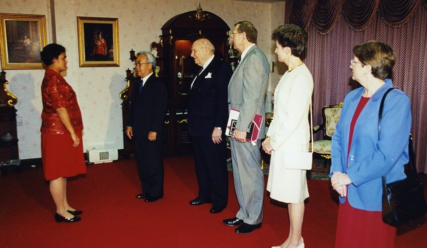 William Young, third from left, welcomed representatives of the Thailand royal family during a visit to Edgewood College in 2000.