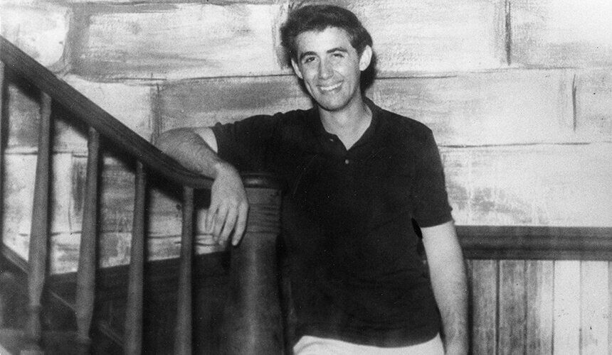 Andrew Goodman standing at the foot of a staircase, age 19, Andrew Goodman was a civil rights activist and volunteer for the Freedom Summer project. (Image courtesy of the Wisconsin Historical Society, #98269.) Andrew Goodman leaning on a stairwell.