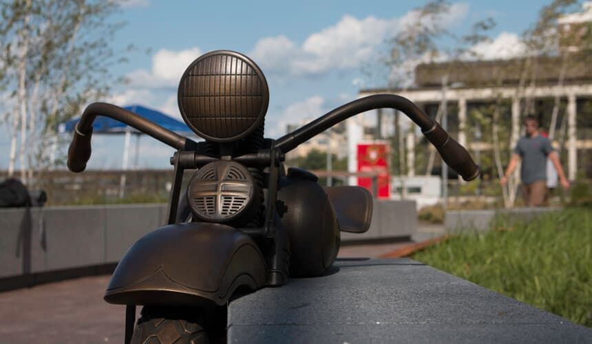 Close-up of the Harley tribute motorcycle handlebars.
