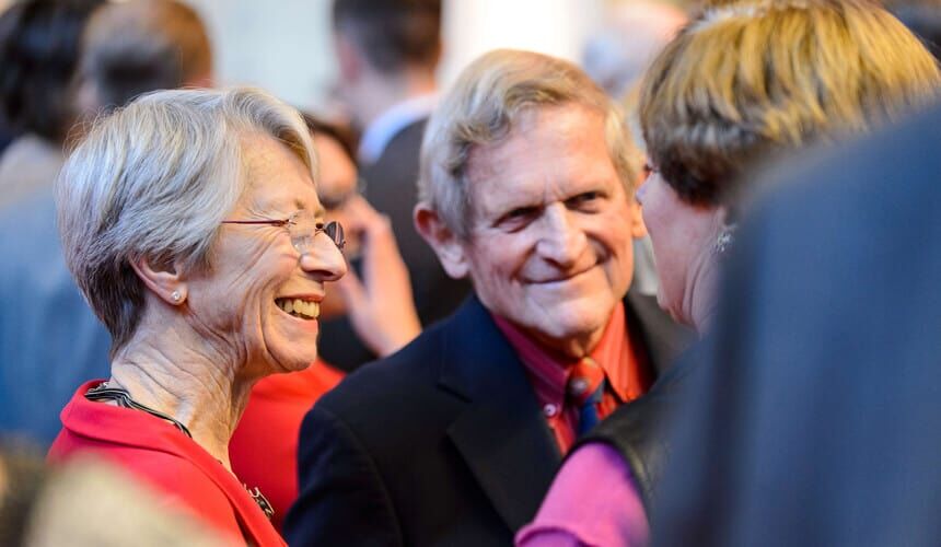 Philanthropists Tashia and John Morgridge talk with guests as more than 800 UW-Madison alumni, friends and representatives gather for the launch of a major capital campaign. (Image courtesy of University Communications, #20966.) The Morgridges speaking with guests.