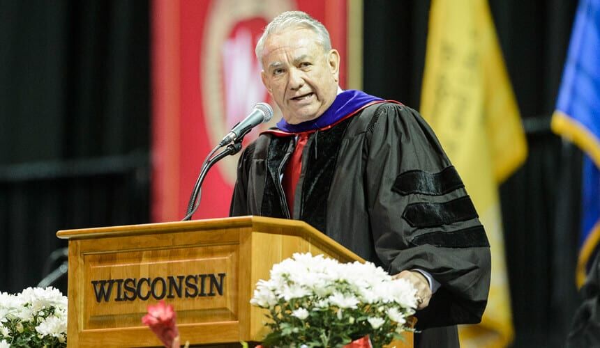 Honorary degree recipient Tommy Thompson, former Wisconsin Governor, addresses the graduates and their families during UW-Madison's spring commencement ceremony.