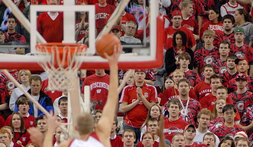 Fans cheering on the UW basketball team