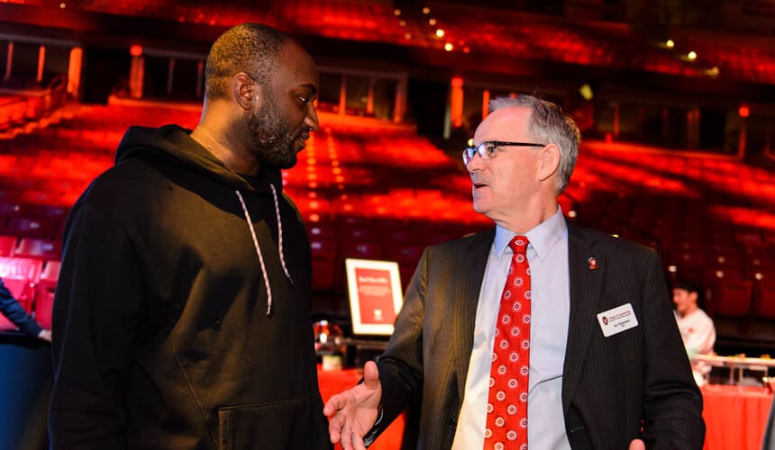 Virgil Abloh, left, talks with Ian Robertson, dean of the College of Engineering.
